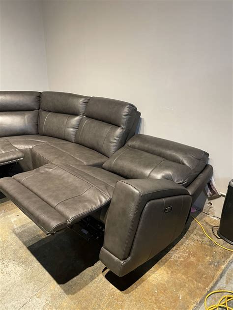 00 $7,497. . 6piece leather power reclining sectional with power headrests